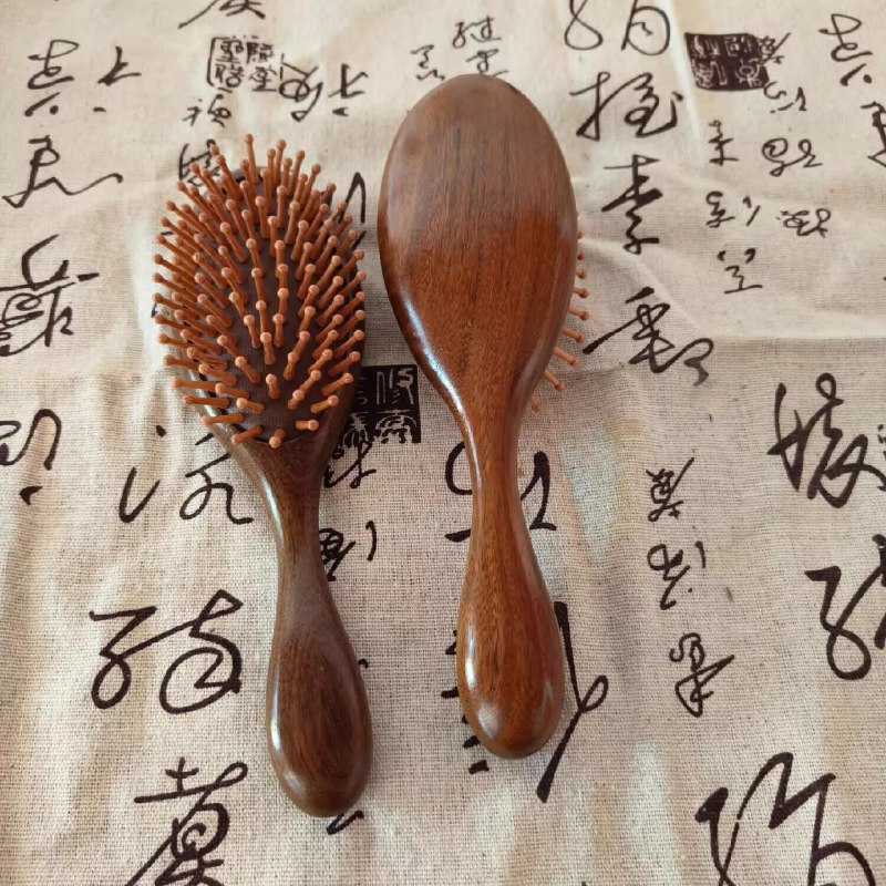 13.8元，金丝檀圆气垫木梳檀木梳